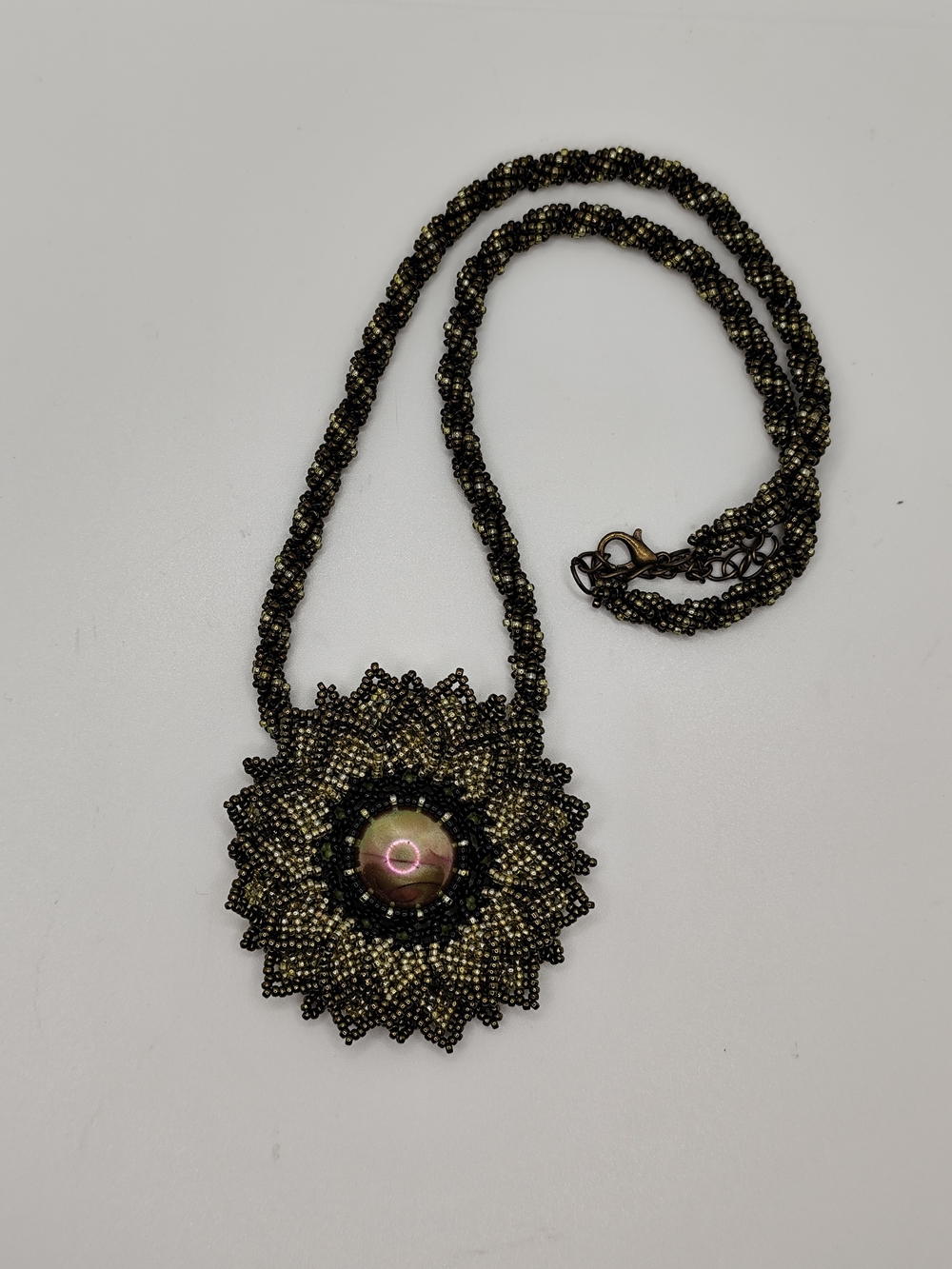 Beaded Sunburst Pendant Necklace - Green and Black